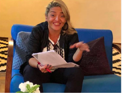 Lola in conversation during a cultural planning meeting in Brasília