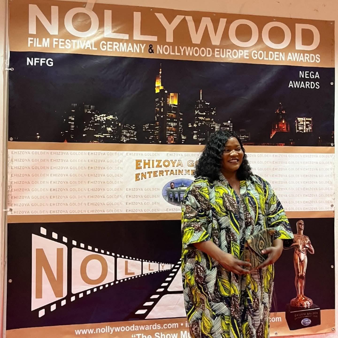 Cassie Kabwita with her award at the Nollywood Film Festival Germany