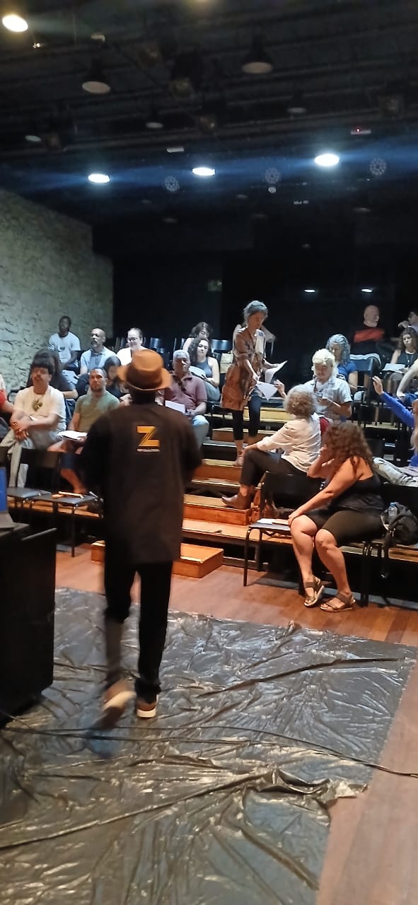 Prince Kojo-Hilton addressing an audience at a theatre workshop in Rio de Janeiro